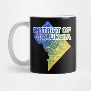 Colorful mandala art map of District of Columbia with text in blue and yellow Mug